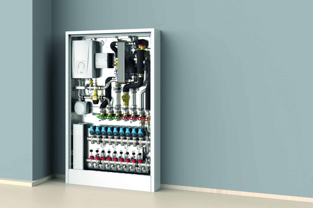 Moderne Wohnungsübergabestation mit integrierter Heizungs- und Warmwassertechnik – platzsparende Lösung für dezentrale Energieversorgung und präzise Regelung im Wohnungsbau