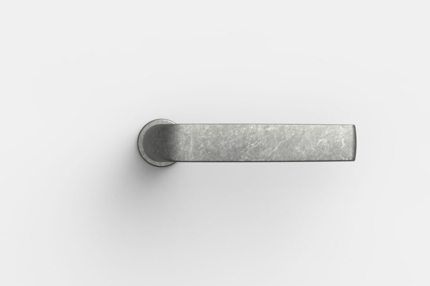 Türdrücker-Modell aus der Serie FSB Aluminium Pure mit runder Rosette und flachem Griffquerschnitt, Ansicht von oben.