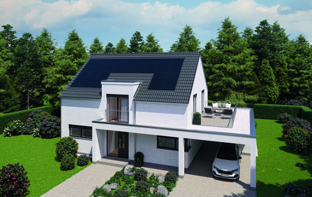 Modernes Einfamilienhaus mit integrierter Indax-Photovoltaikanlage auf dem Dach und Terrasse im Grünen.