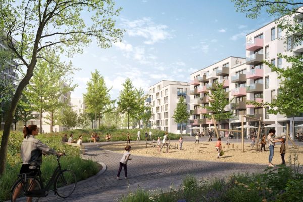 Belebter Marienhöfe Spielplatz in grünen Aufenthaltsbereichen zwischen modernen Wohngebäuden.