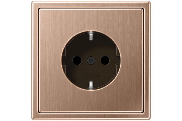 JUNG LS 990 SCHUKO Steckdose in Bronze gebürstet mit quadratischem Rahmen in edler Metalloptik.