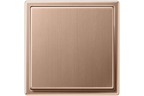 JUNG LS 990 Lichtschalter in Bronze gebürstet mit einer edlen, mattierten Metalloberfläche und klarer Formgebung.