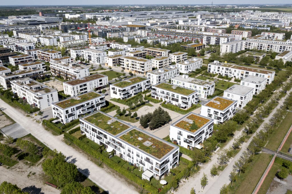 Rows of modern residential buildings, aerial view.