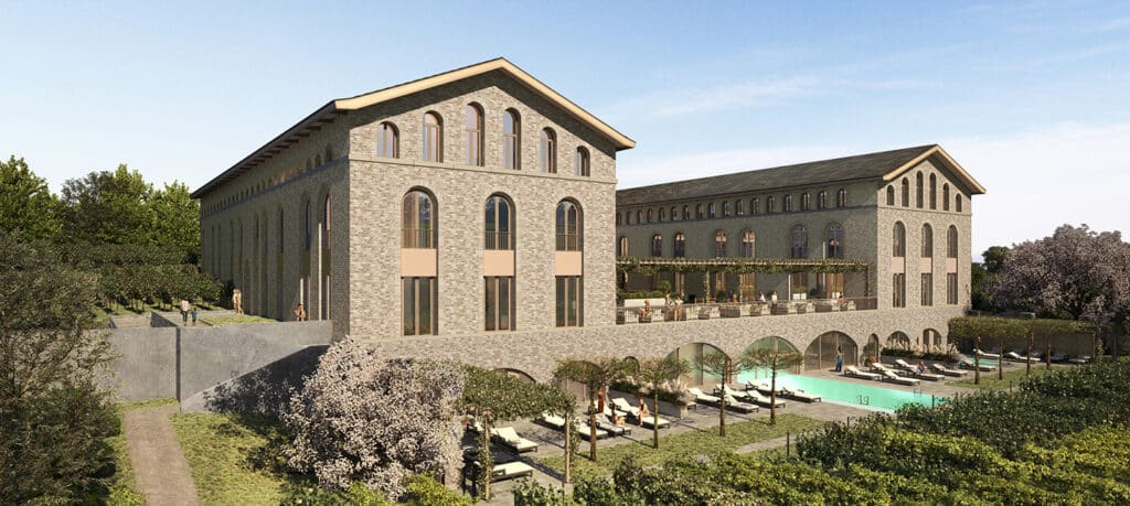 Moderne Hotelanlage mit Steinfassade, Pool und Gartenbereichen