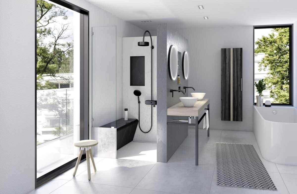 Modernes Badezimmer mit bodengleicher Dusche, Waschtisch und Wanne – umgesetzt mit Wedi-Bauelementen für fugenlose, wasserfeste Flächen.
